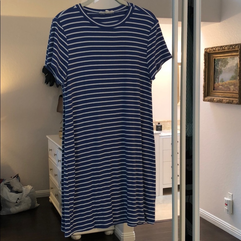 T-shirt Dress cute with white sneakers.
